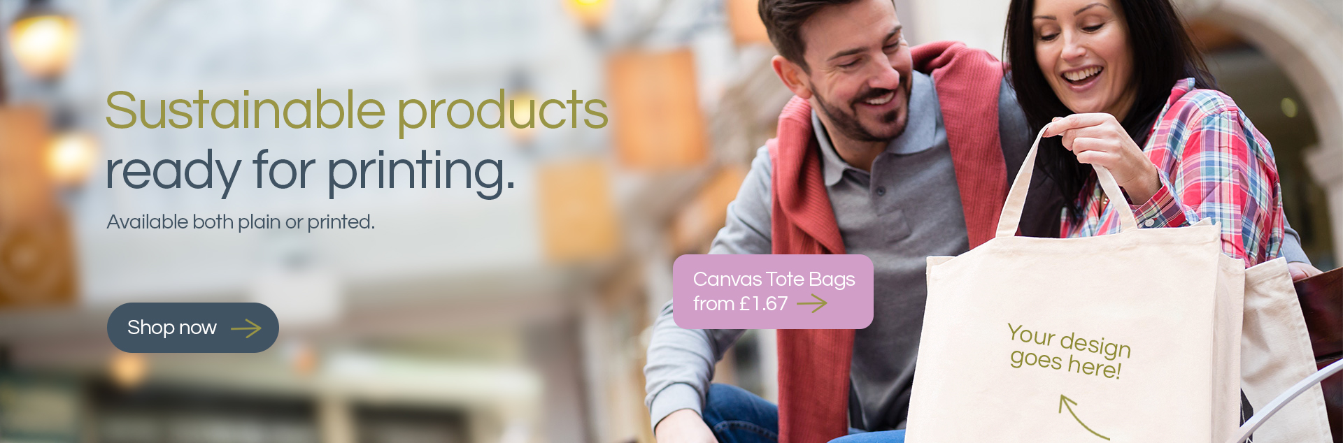 A seated couple are admiring some cotton tote shopping bags. Overlaid on the image is text 'Sustainable products ready for printing. Available both plain and printed. Shop now.' and also 'Canvas tote bags from £1.67' and 'Your design goes here' with an arrow pointing at one of the bags.