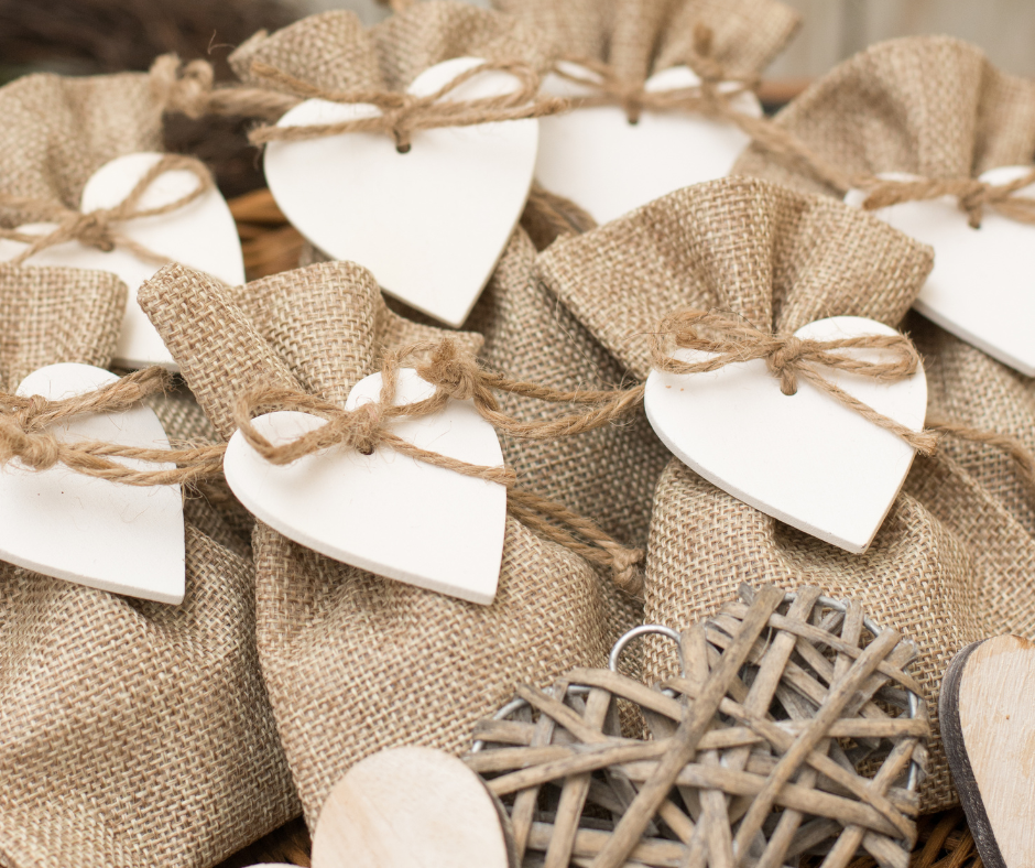 image of jute drawstring bags with a heart shaped tag as wedding favours