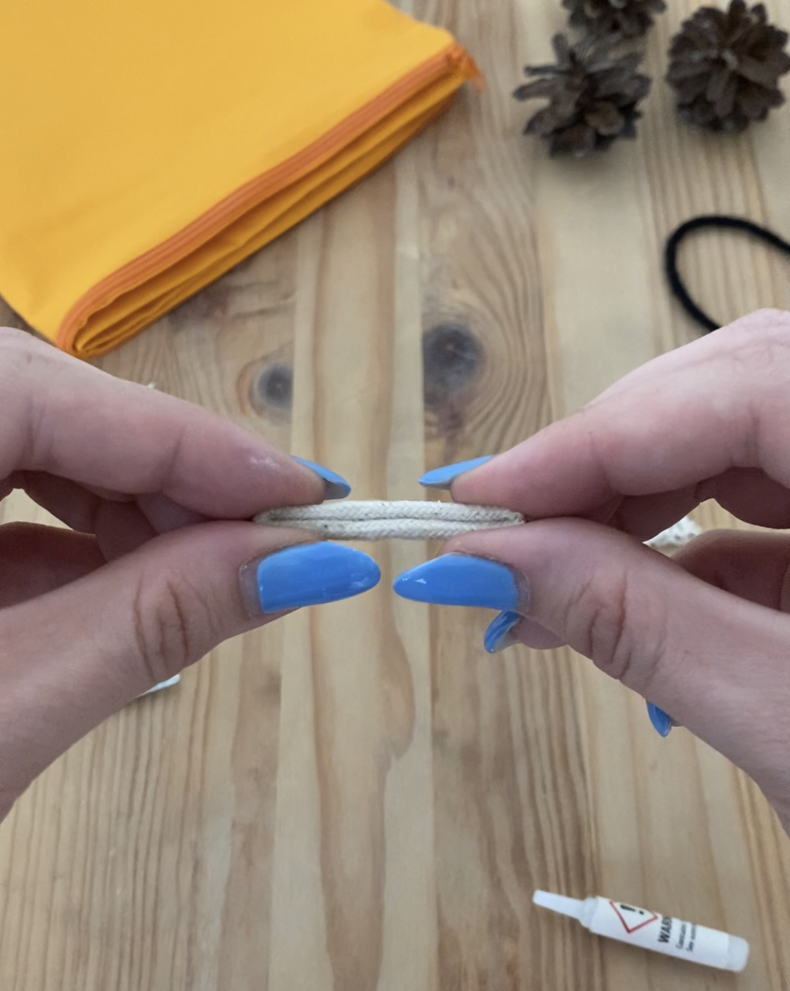 apply pressure to the rope to ensure it is stuck together