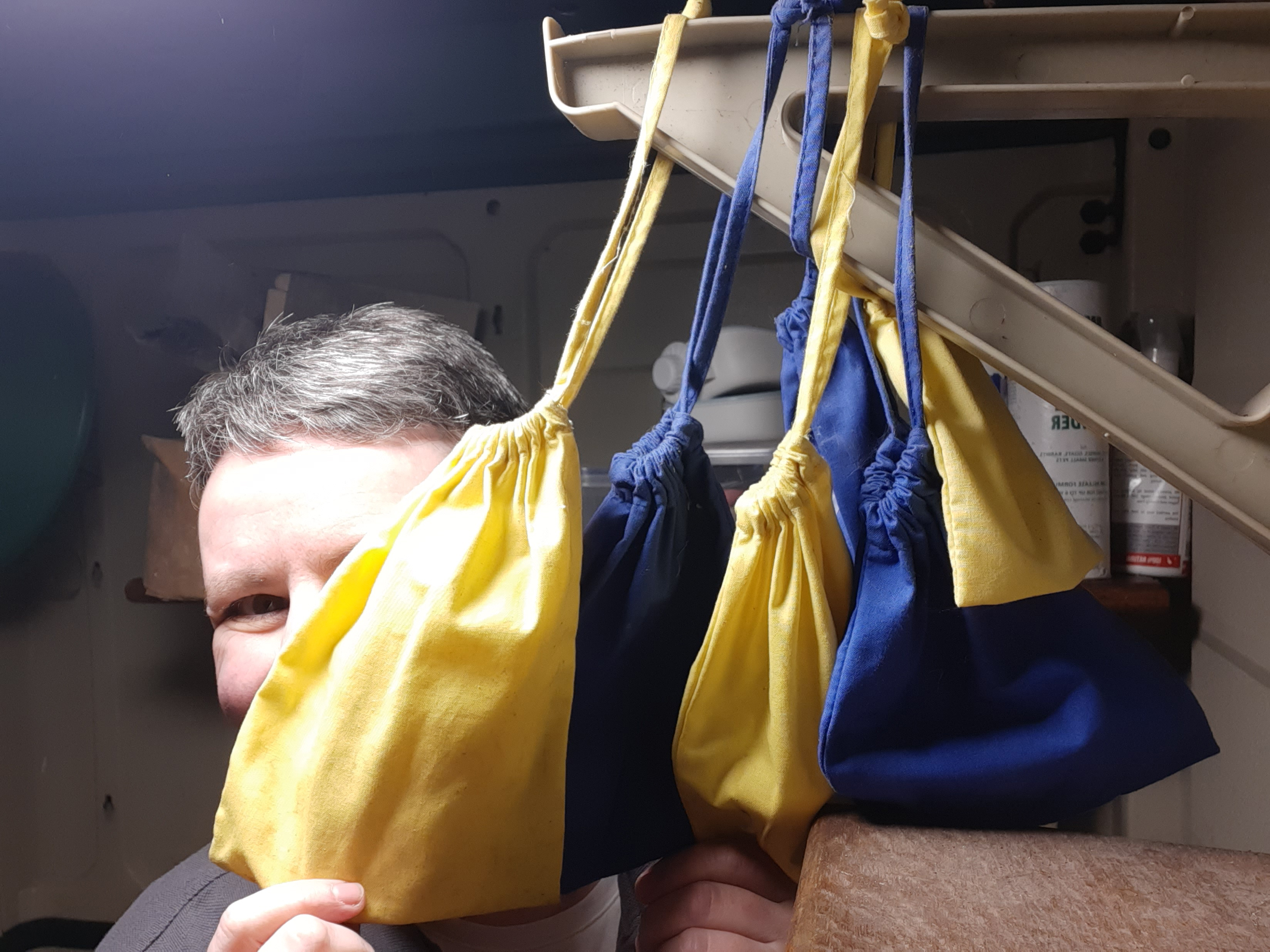 an image with Sandra peering behind her favourite Clever Baggers Products