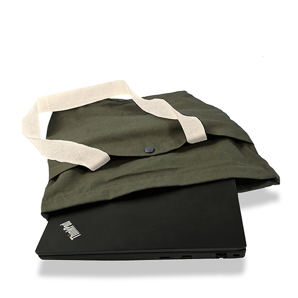 an image showing a mid-sized laptop inside the convertible tote backpack