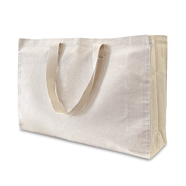 Large beige cotton canvas tote bag, wider than it is tall, and with a deep all-round gusset to give even more capacity.