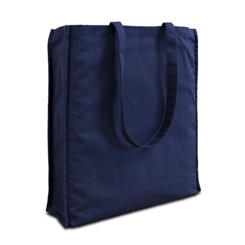 Strong cotton canvas navy tote bag, classic portrait style and standard size 38 x 43cm with depth of 10cm, and long handles for carrying over the shoulder.