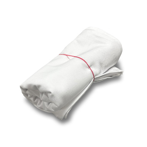 Set of white napkins neatly rolled into a bundle